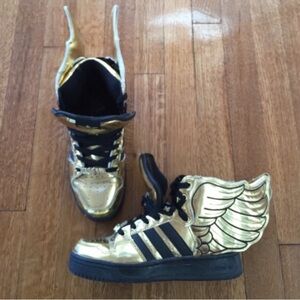 Jeremy Scott Adidas gold wing limited edition shoes.